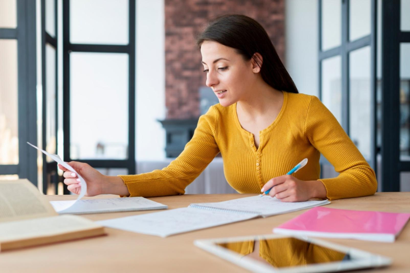 Student reviewing personal budget plan during workshop session